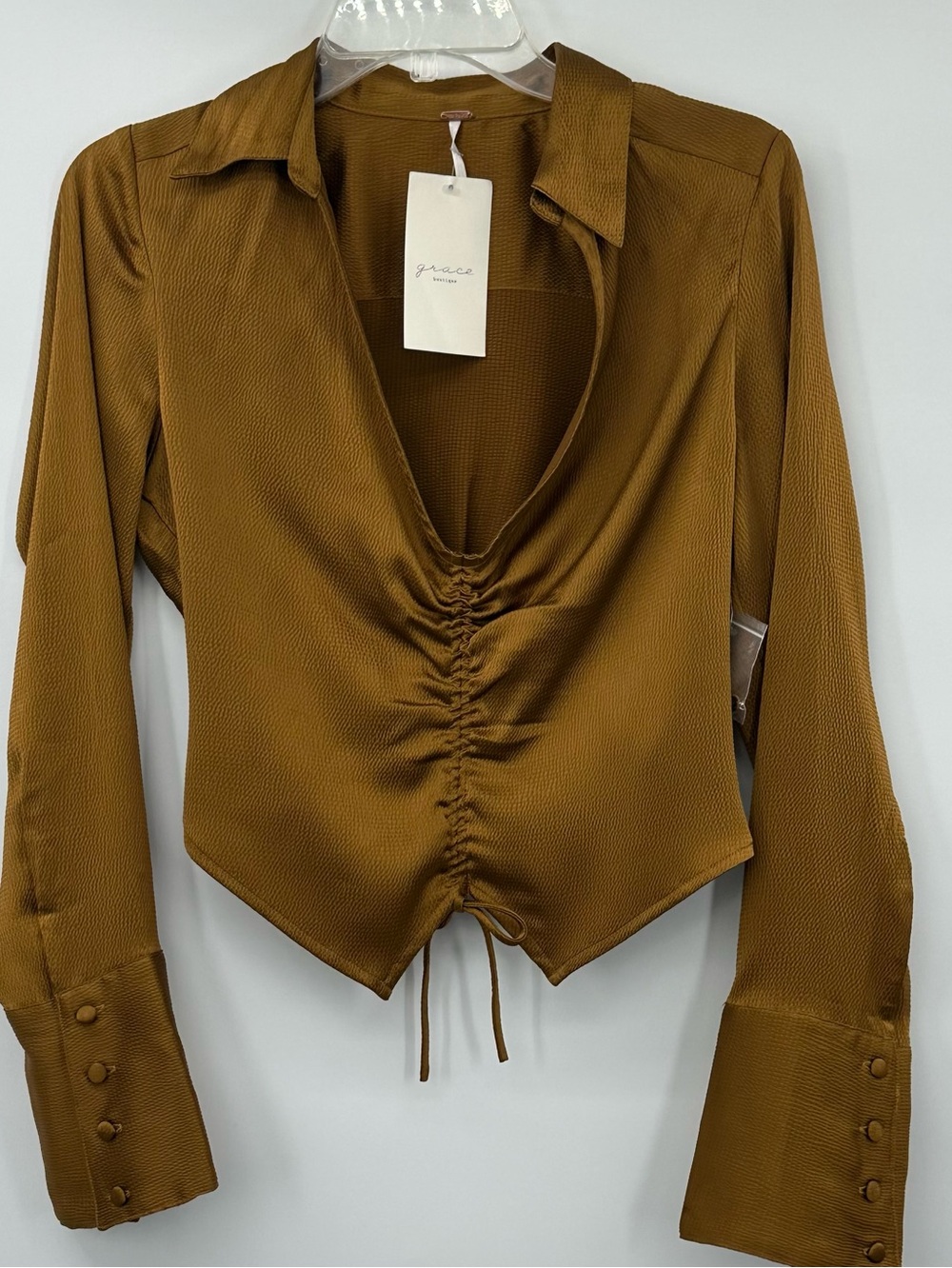 Free People Tiger Eye Long sleeve Blouse size S NWT